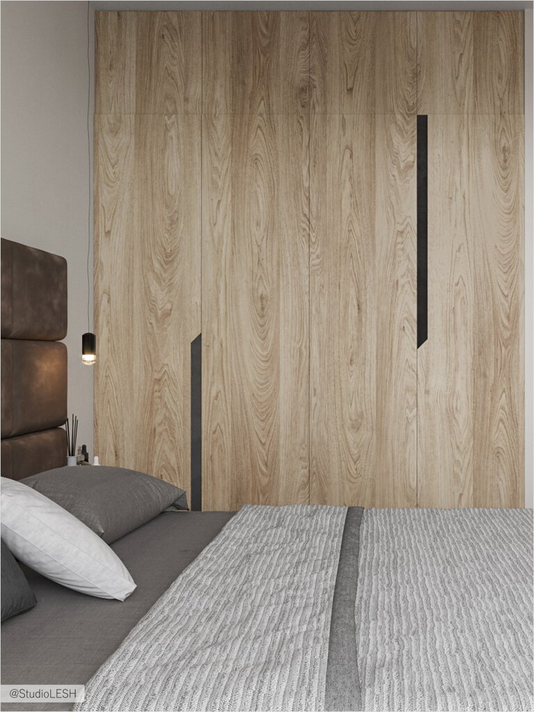 The combination of wooden wardrobe and pastel bedroom