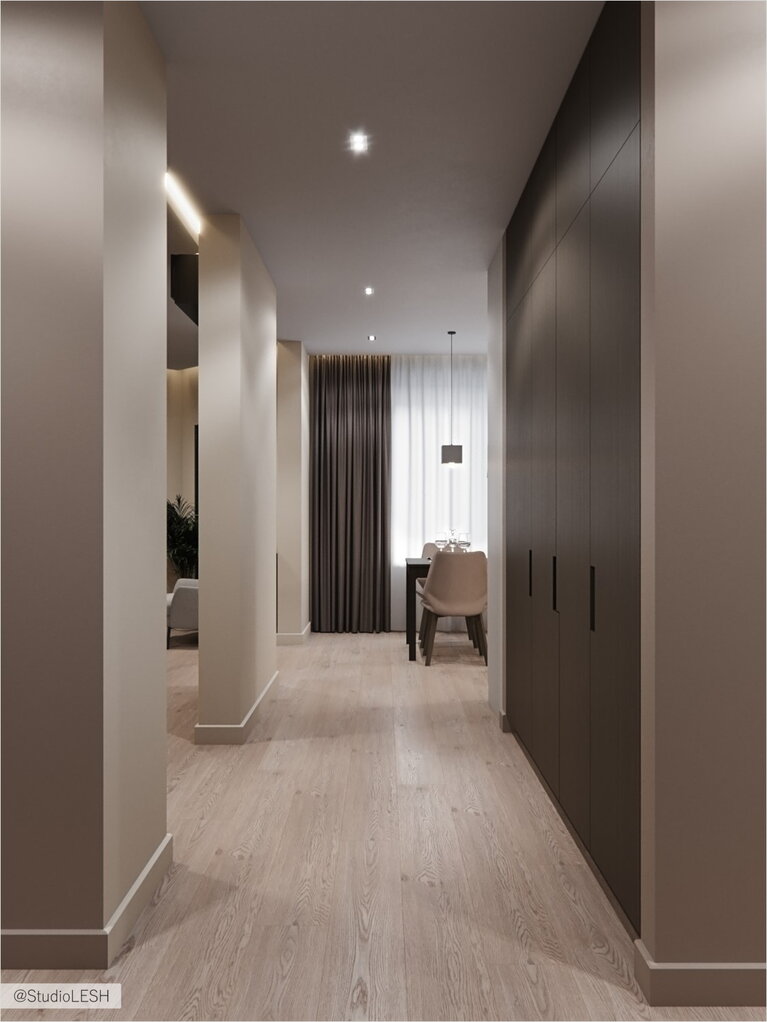 The hall in light tints with the storage system from the floor to the ceilings