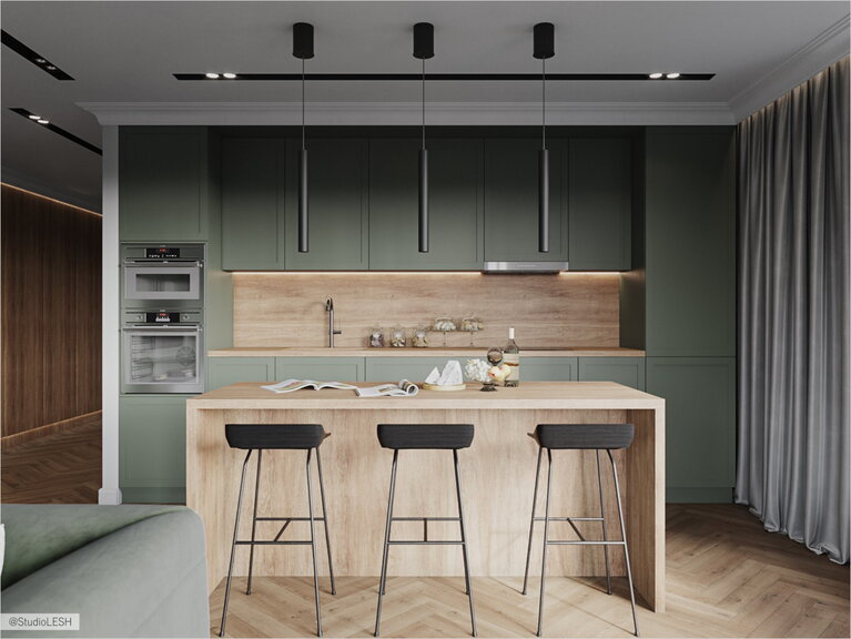 Kitchen island of light wood with additional dining area