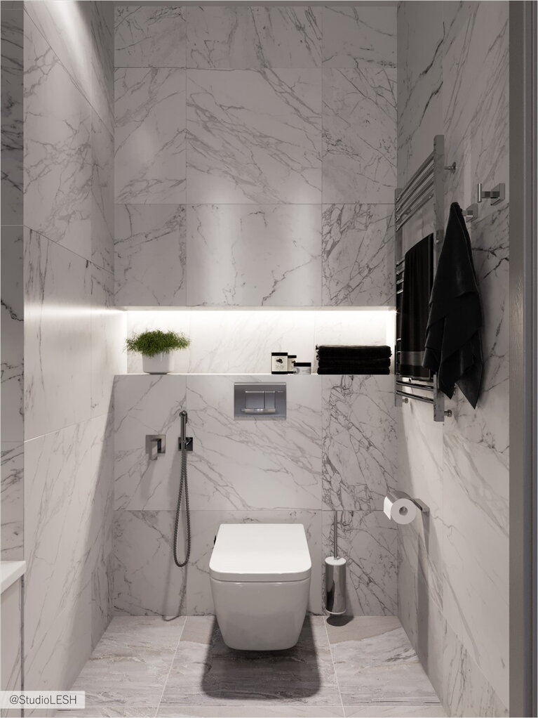  Combined bathroom with a niche for bathroom amenities in a false wall