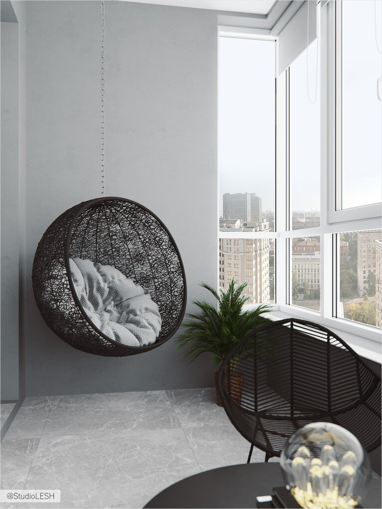  Balcony with suspended chair and seating area