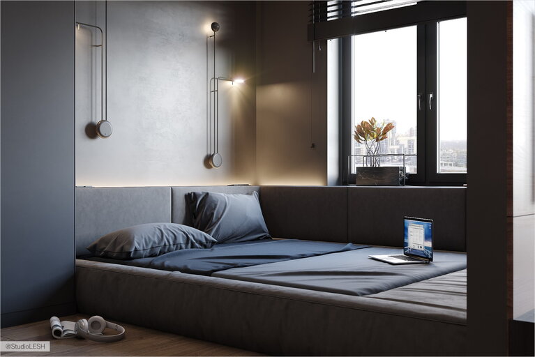 Soft pillows in the bedroom in dark color