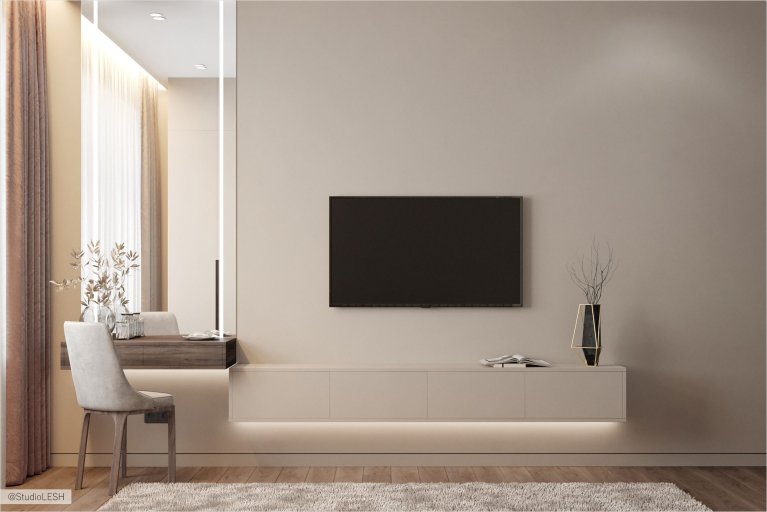 Изображение светлой и просторной гостиной с современным дизайном. В комнате есть все необходимое для комфортного проживания и отдыха: удобный диван, туалетный столик для макияжа, телевизор для просмотра фильмов и передач, места для хранения вещей и современный декор