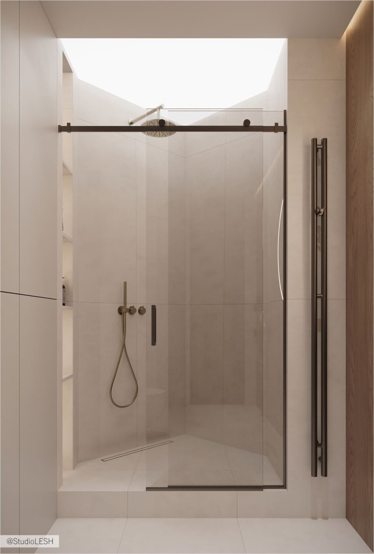 Современная душевая кабина с минималистическим дизайном. Прозрачные стеклянные двери и хромированные детали создают ощущение легкости и чистоты. Внутри душевой кабины есть все необходимое для комфортного принятия душа