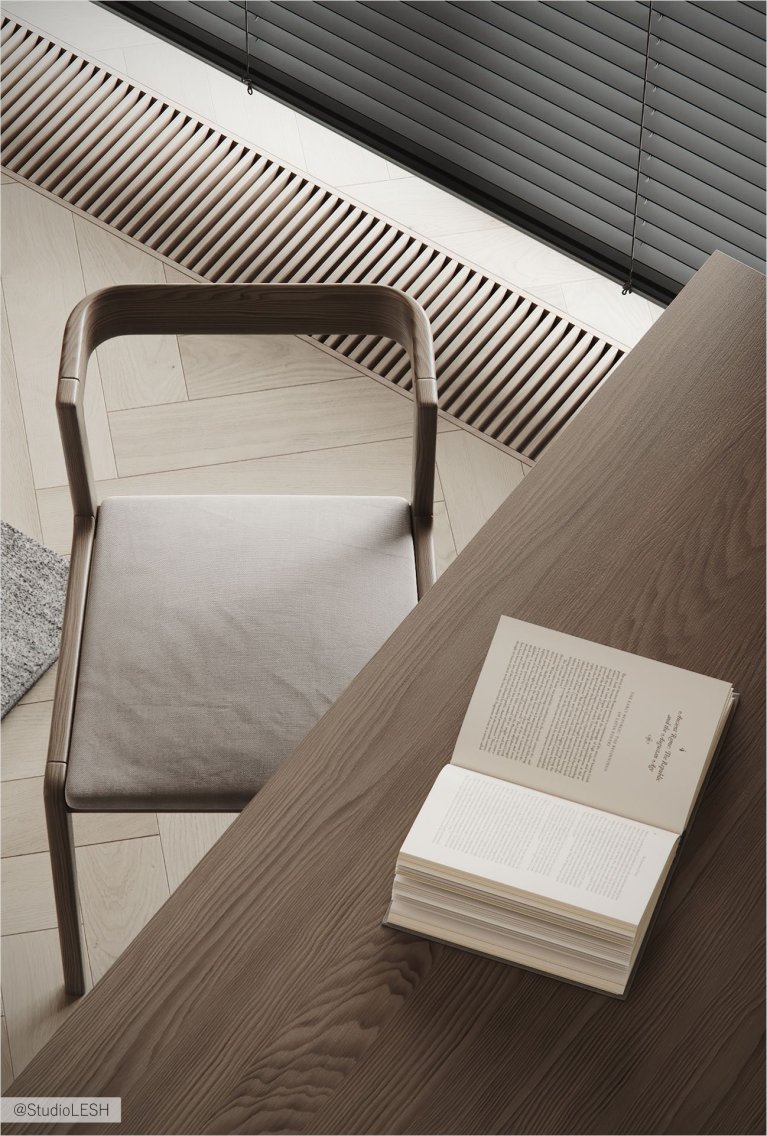 На фотографии изображено рабочее место с удобным стулом с мягким сиденьем, открытой книгой на столе и минималистичным дизайном. Видны также жалюзи на окне и радиатор отопления