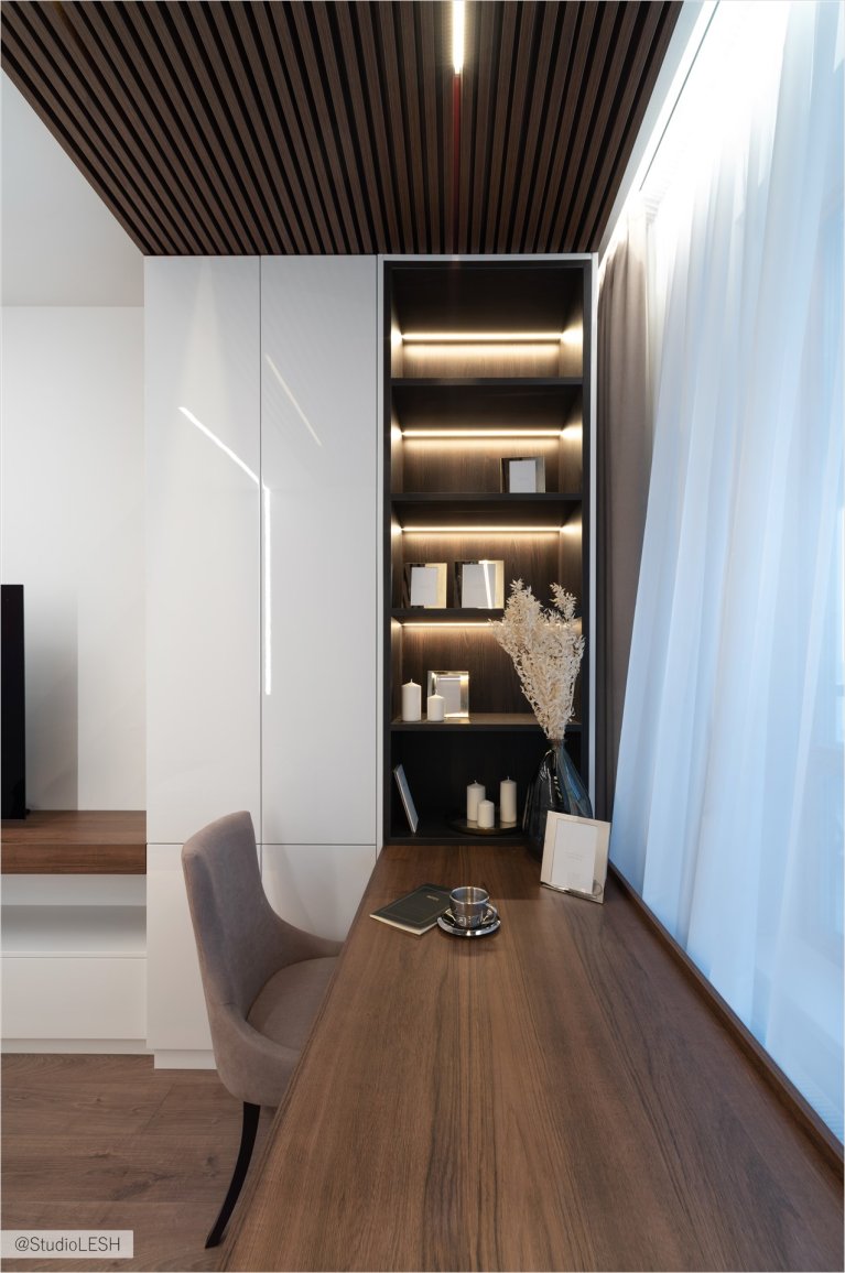 Интерьер спальни с элементами минимализма и скандинавского стиля, где сочетаются светлые оттенки и натуральные материалы